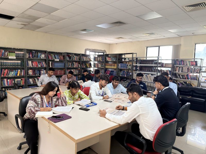 Students reading at the iFEEL Library